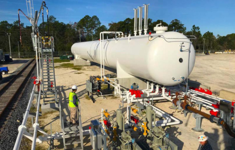 Butane transload facility construction site with workers and equipment