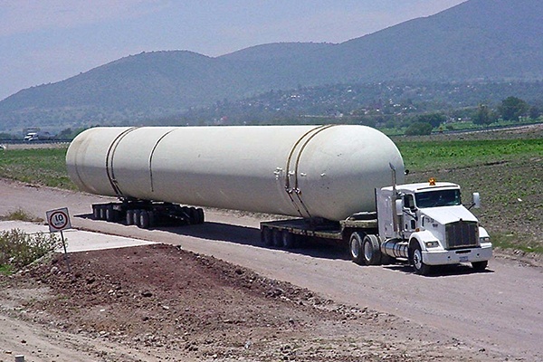 1b NGL LPG Propane Storage Tank Heavy Hauling - Truck Hauling Delivery.jpg